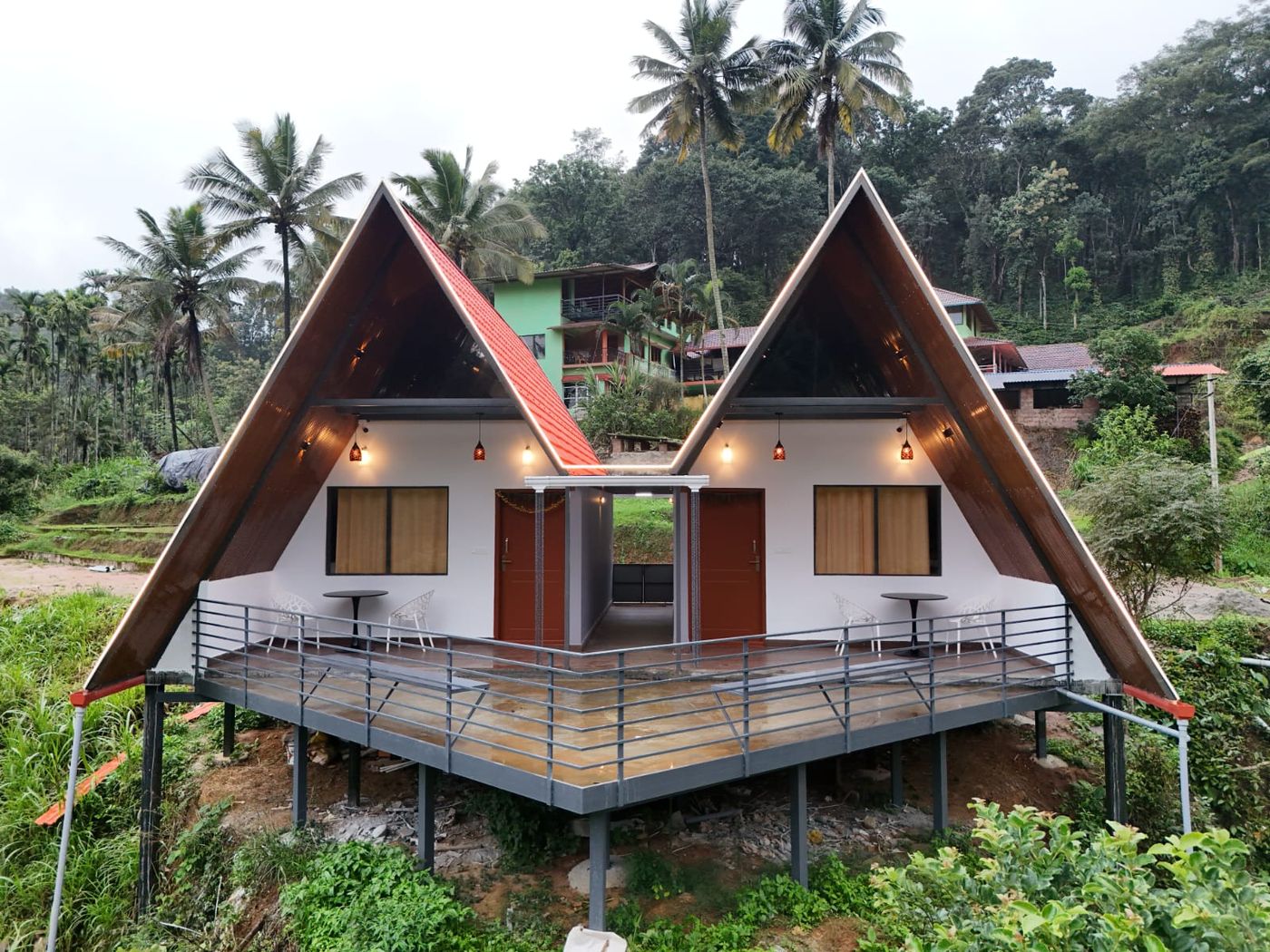 Angled exterior view with neighbouring hillside
