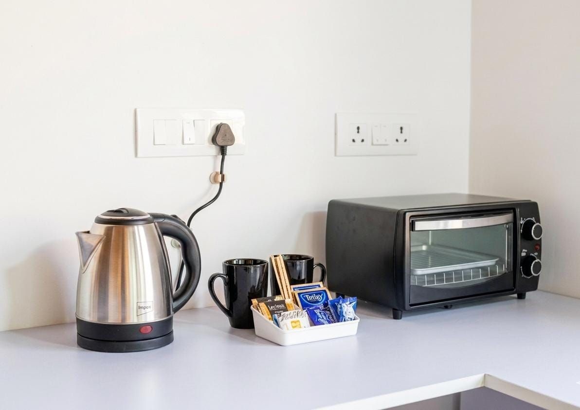 Tea and coffee station with kettle and toaster oven