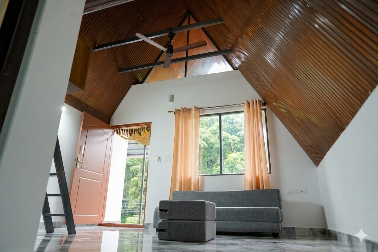 Ground floor living area with sofa and balcony